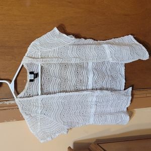 A white shrug